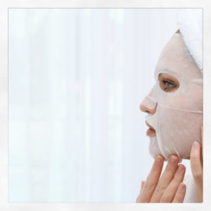 woman’s face with cbd face mask on